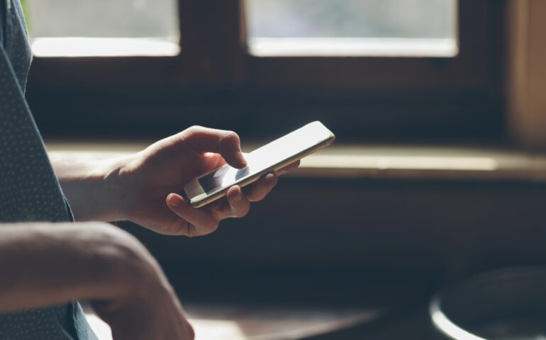 young man on his phone