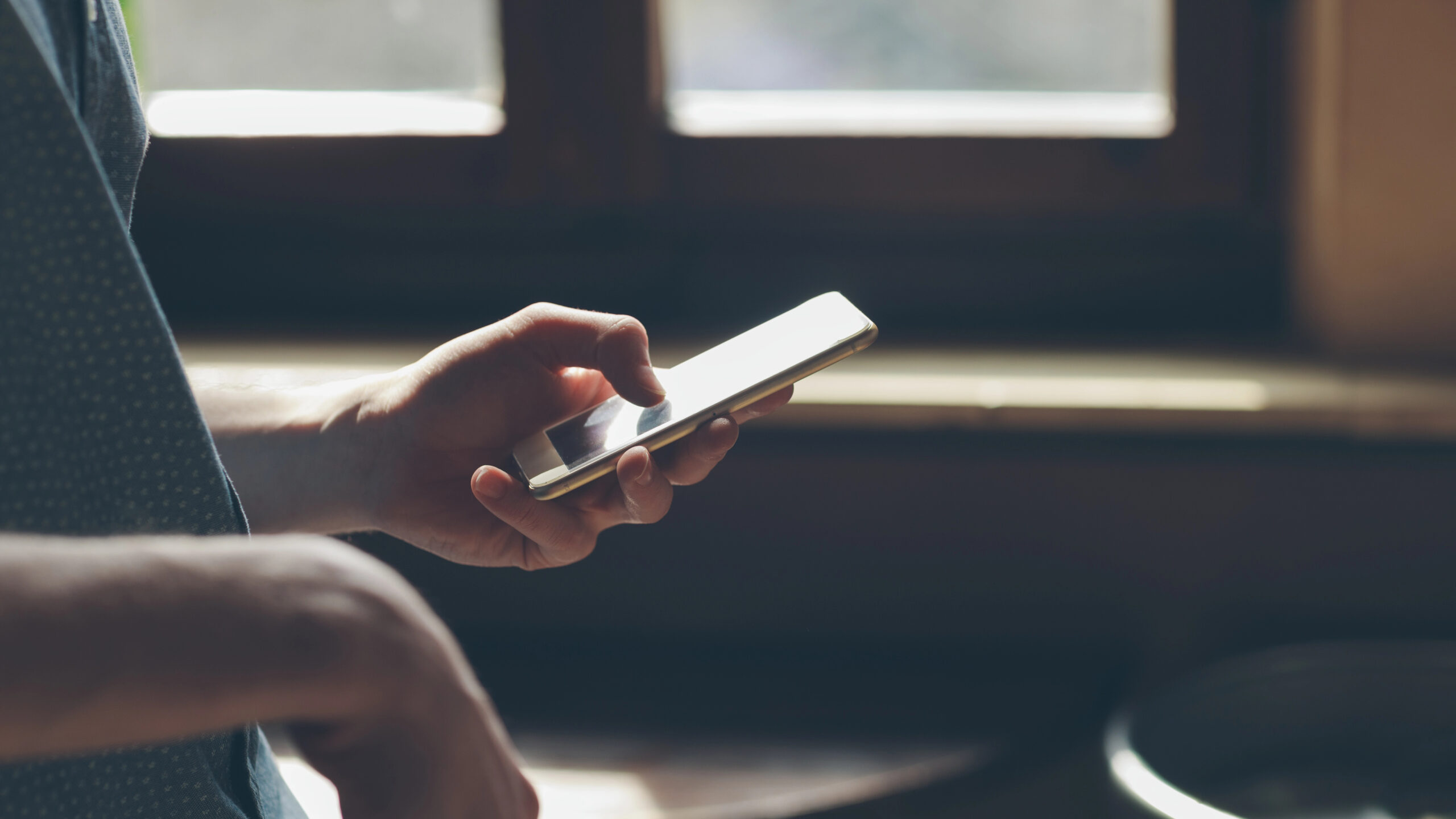 young man on his phone